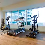 Comfort 1Br Without Living Room At Grand Kamala Lagoon Apartment By Travelio